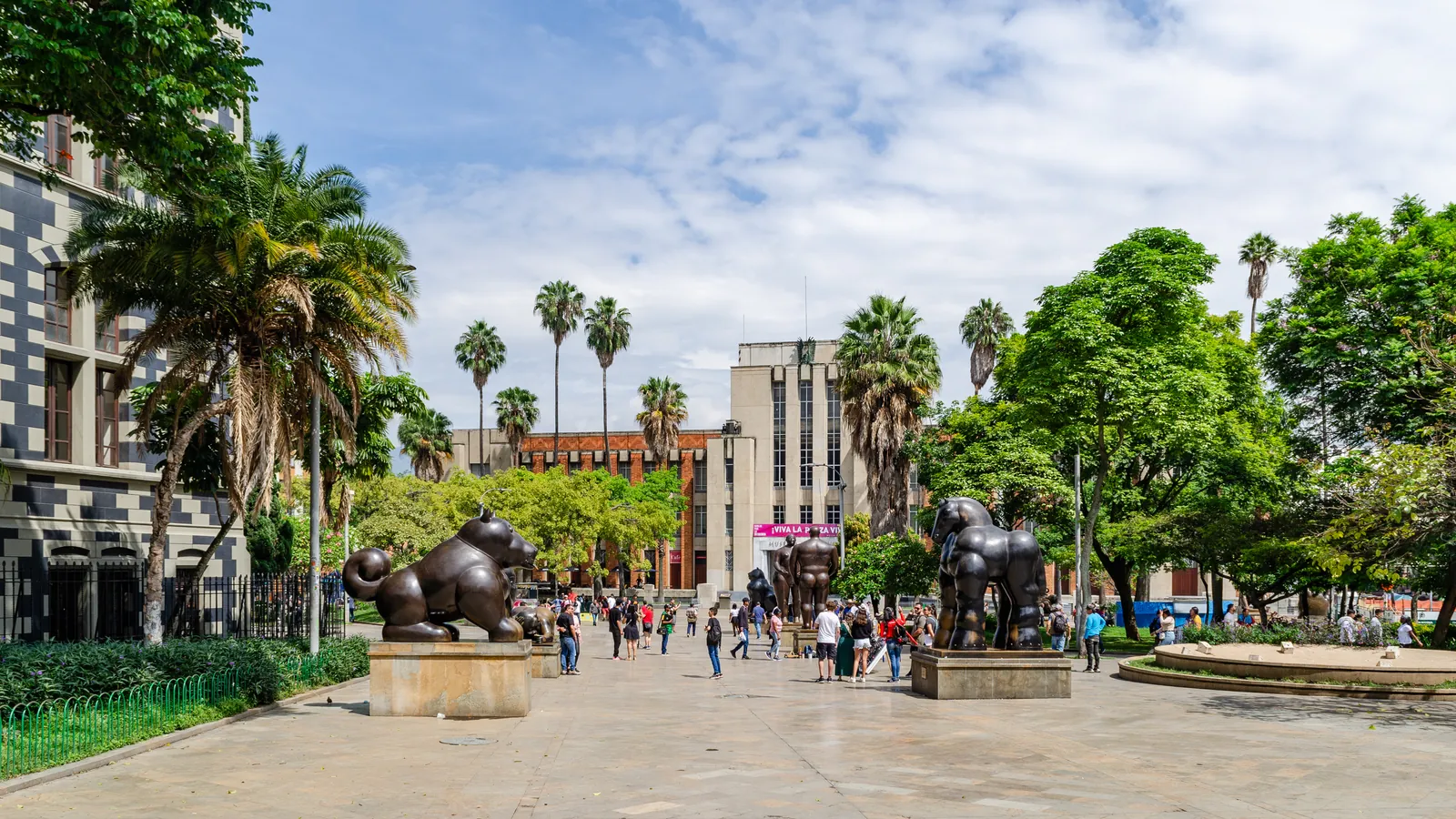 Botero sculptures and palm trees in Plaza Botero, Medellín
